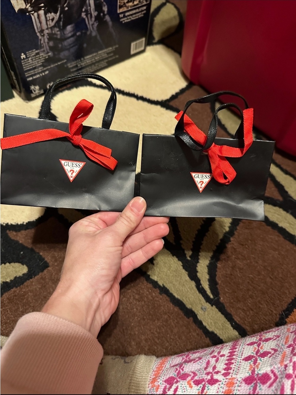 GUESS Black Mini Gift Bags with Red Ribbon Accents